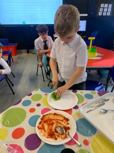 Students at Inchmarlo School engaging in classroom activities and meals.