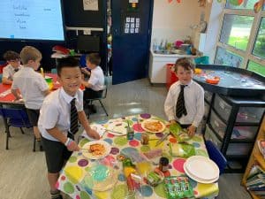 Children enjoying activities at Inchmarlo nursery in a vibrant classroom.