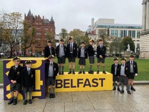 Students in school uniforms at Inchmarlo, Belfast, outdoor educational setting.