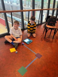 Two children engaging with educational activities at Inchmarlo.