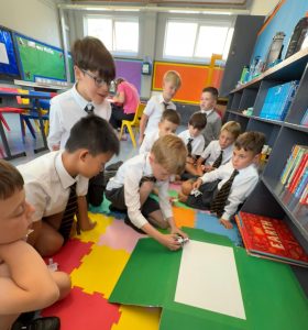 Children engaging in educational activities at Inchmarlo School.