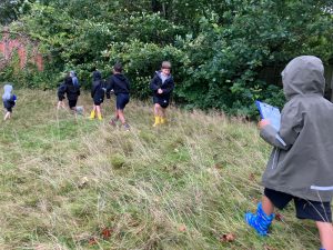 Children exploring nature at Inchmarlo outdoor education.