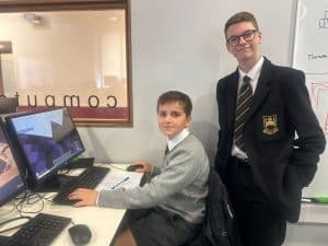Students using computers at Inchmarlo educational facility.
