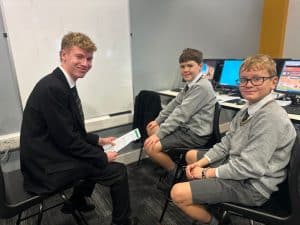 Students engaging in classroom learning at Inchmarlo.