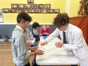 Children engaging in hands-on learning activities at Inchmarlo.