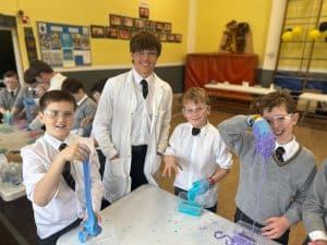 Students enjoying science activities at Inchmarlo School in Scotland.