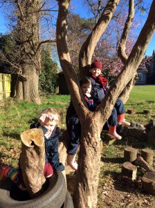 Children playing and exploring nature at Inchmarlo estate park.