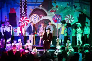 Scene from Inchmarlo performing arts production with children and teenagers.