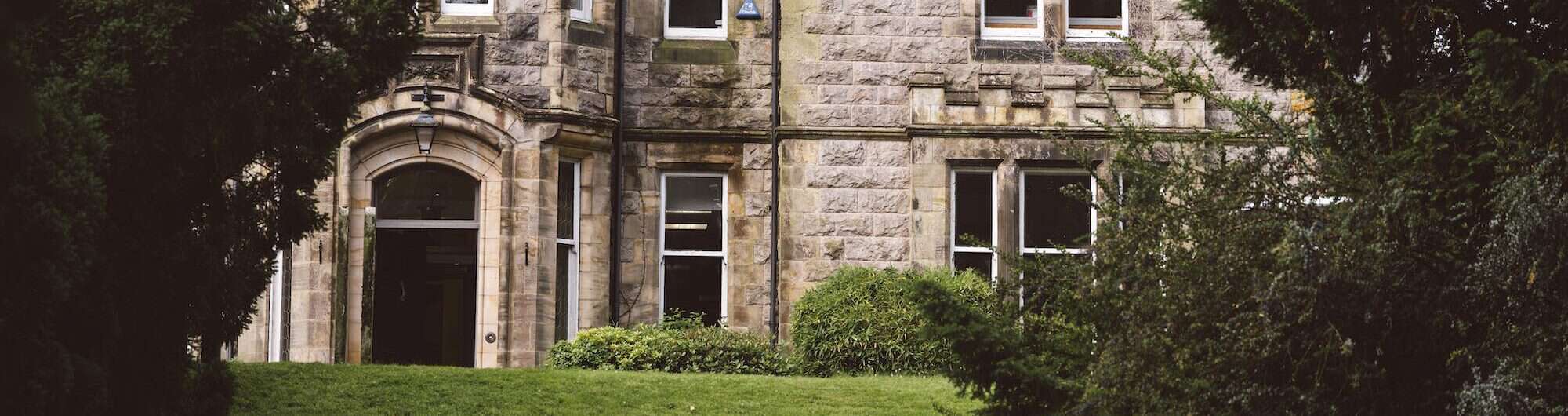 Beautiful stone-built estate with lush landscaping at Inchmarlo.