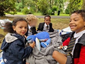 Children enjoying outdoor play at Inchmarlo school playground.