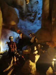 A vibrant display of a fireman rescue scene with emergency responders working in a smoky environment.