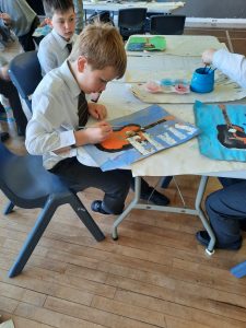 Children engaged in creative art activities at Inchmarlo.