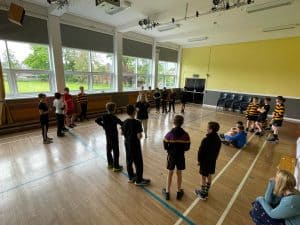 Children engaging in classroom activity at Inchmarlo School, showcasing a bright learning environment.