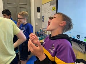 Young students engaging in classroom activities at Inchmarlo School.