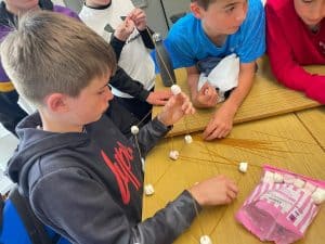 Children engaging in hands-on activities at Inchmarlo School.