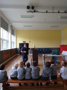 Children listening to a story in the classroom.