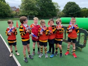 Children enjoying outdoor activities at Inchmarlo school.