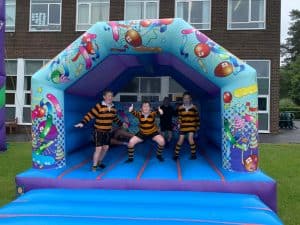 Colorful inflatable bounce house for children's play at Inchmarlo.
