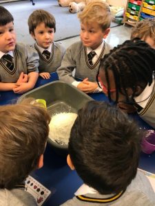 Young students exploring science activities and hands-on learning.