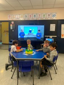 Young children engaged in a classroom activity at Inchmarlo School.