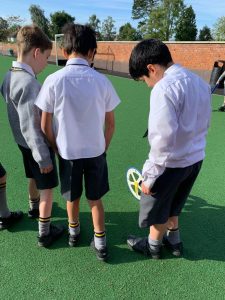 Students engaging in outdoor activity at Inchmarlo School.