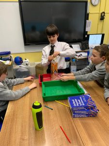 Children engaging in a classroom activity at Inchmarlo School, highlighting quality education.