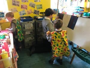 Children engaging in creative activities at Inchmarlo preschool.