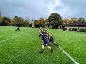 Children playing sports at Inchmarlo estate in Scotland.