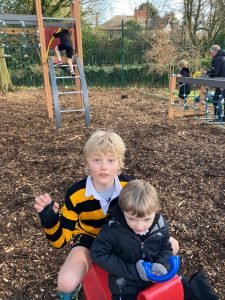 Kids playing on outdoor playground at Inchmarlo, perfect for family fun and outdoor activities.