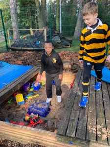 Children playing in a fun outdoor playground at Inchmarlo.