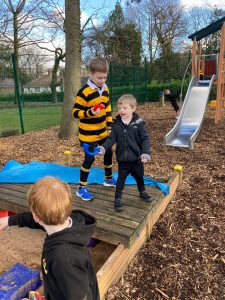 Children playing on outdoor playground at Inchmarlo. Safe, fun outdoor space for kids.