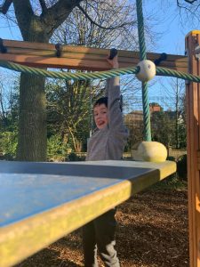 Children enjoying outdoor play at Inchmarlo estate in sunny weather.