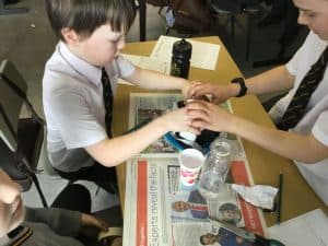 Children engaging in educational activity at Inchmarlo School.