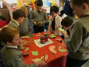 Children engaging in creative activities at Inchmarlo preschool.