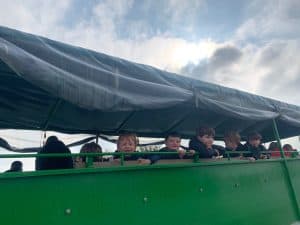 Children enjoying boat ride at Inchmarlo nature reserve.