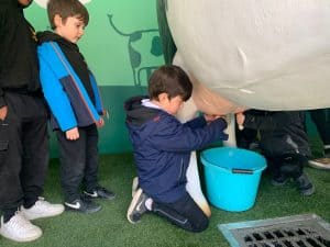Children engaging with outdoor activities at Inchmarlo estate.