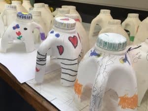 Colorful painted ceramic jugs and pottery pieces.