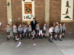 Group of children in school uniform outside Inchmarlo School building.