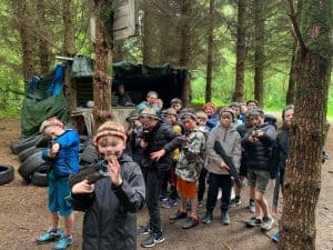 Children enjoying outdoor activities in the wooded Inchmarlo estate.