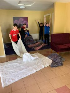 Residents engaging in indoor activities at Inchmarlo care home.