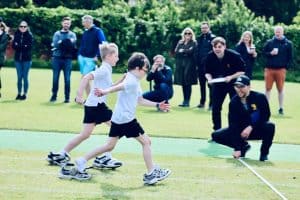 Children enjoying outdoor activities at Inchmarlo estate in Scotland.