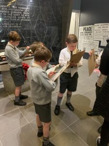 Children exploring historical exhibits at Inchmarlo, highlighting educational tours and family activities.