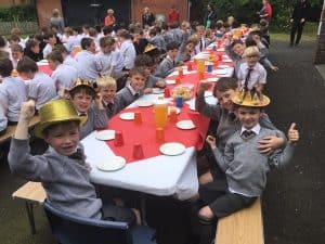 Children’s outdoor birthday celebration at Inchmarlo, with kids in costumes enjoying party fun.