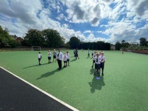 Students enjoying outdoor activities on Inchmarlo school sports field.