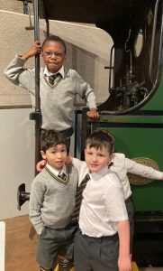 Children enjoying a bus ride at Inchmarlo.
