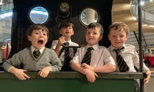 Happy school kids in uniform during a school trip at Inchmarlo.