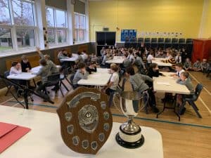 Students participating in classroom activities at Inchmarlo School, showcasing a vibrant learning environment.