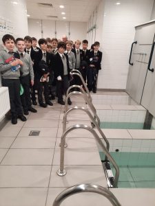 Group of children visiting Inchmarlo, engaging in educational activities at the facility.