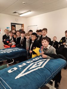 Group of students at Inchmarlo School preparing for a science project.