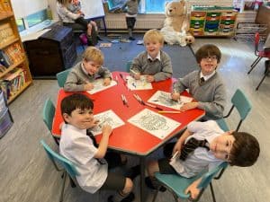 Children engaging in creative activities at Inchmarlo preschool.